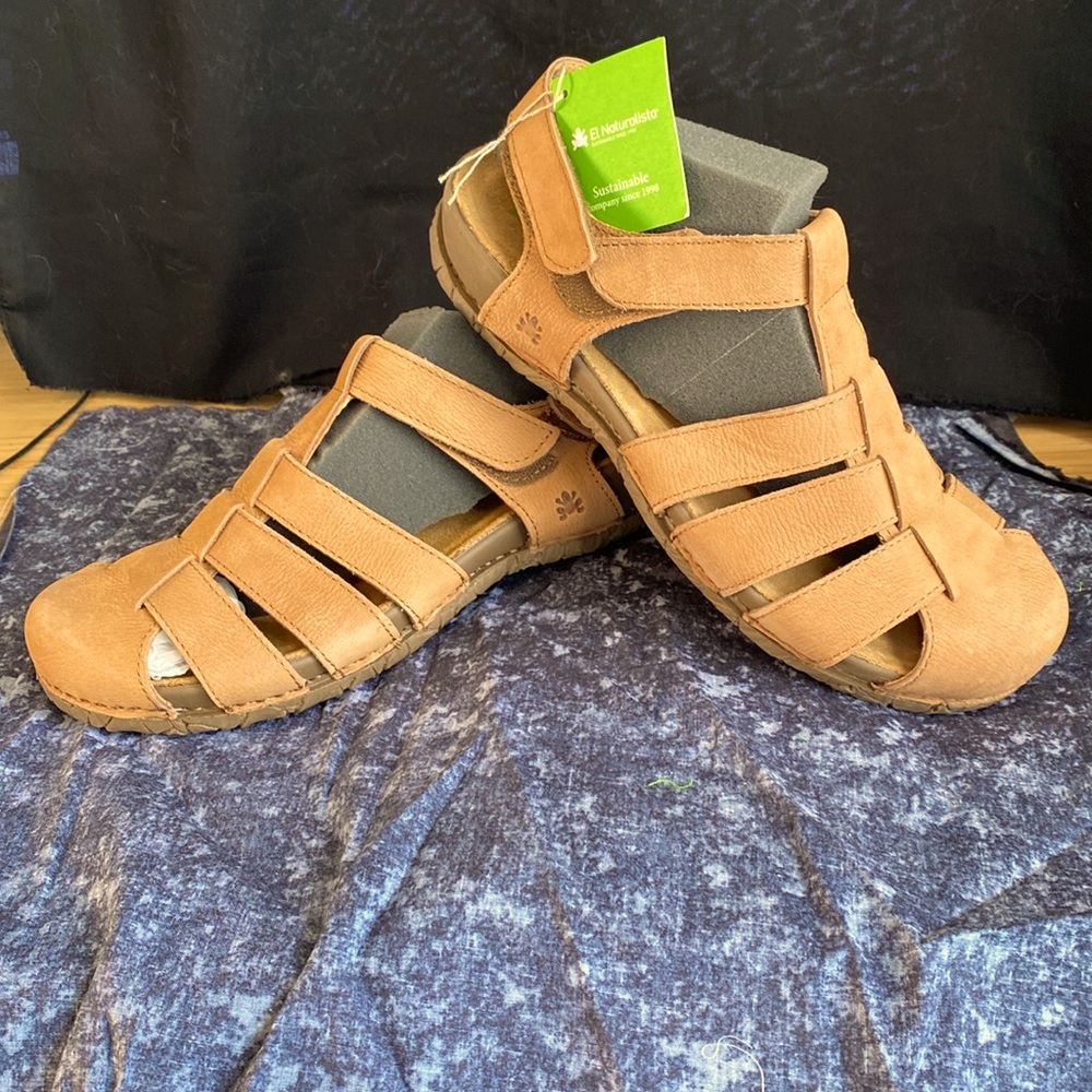 New from box. Leather from Spain.